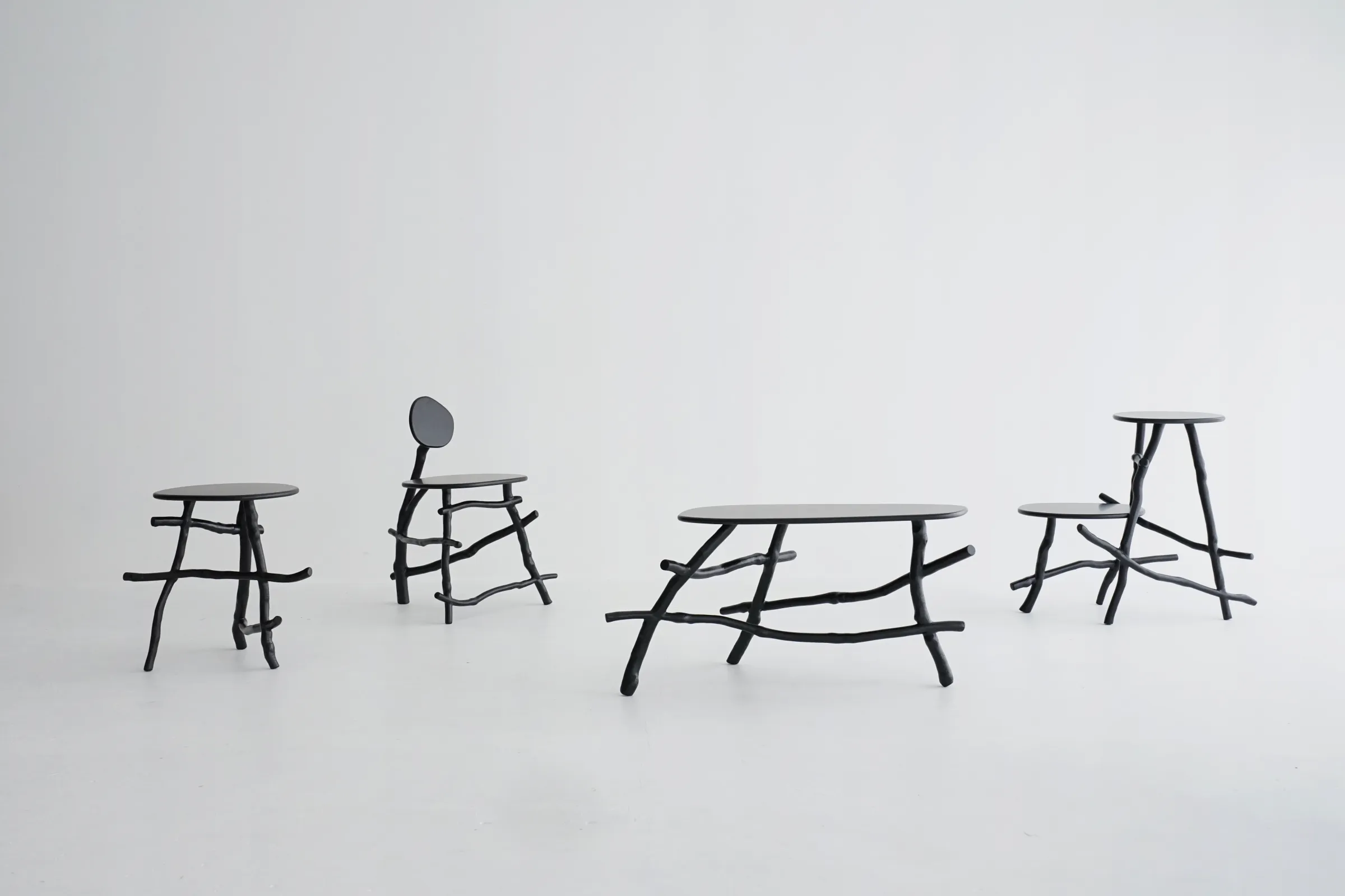 Uneri furniture collection group view of all five pieces made from pruned Tokyo street tree branches by So Tanaka Studio